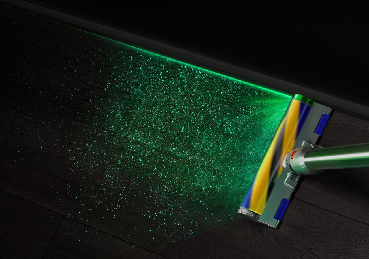 The Dyson V15 has a green laser to highlight dirt particles in front of the vacuum.